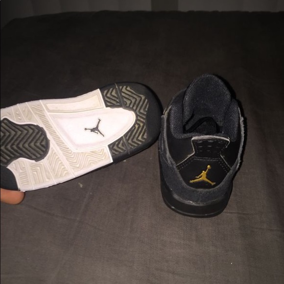 4s jordans black and gold